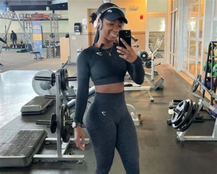 Daijah Wright posing for a photo shoot in Gym.