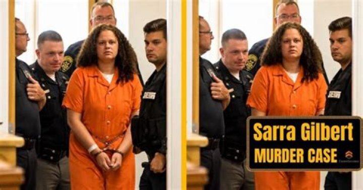 Sarra Gilbert has her hands tied by the handcuffs as police are bringing her to the court.